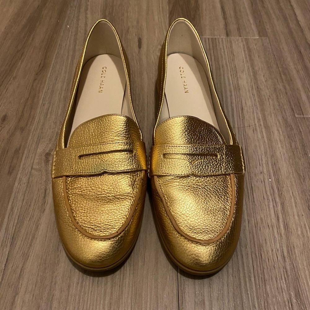 New Cole Haan gold penny loafer shoes
